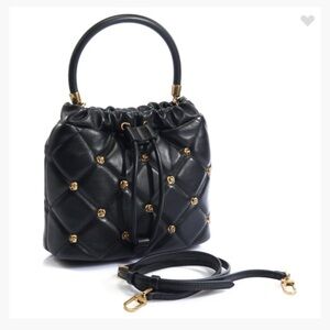 NWT Ted Baker Emily Rosette Bucket Bag in Black w/ gold metal detailing.